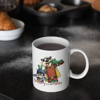 CALVIN & HAROLDO - BATBOY & HOBBIN [CANECA]