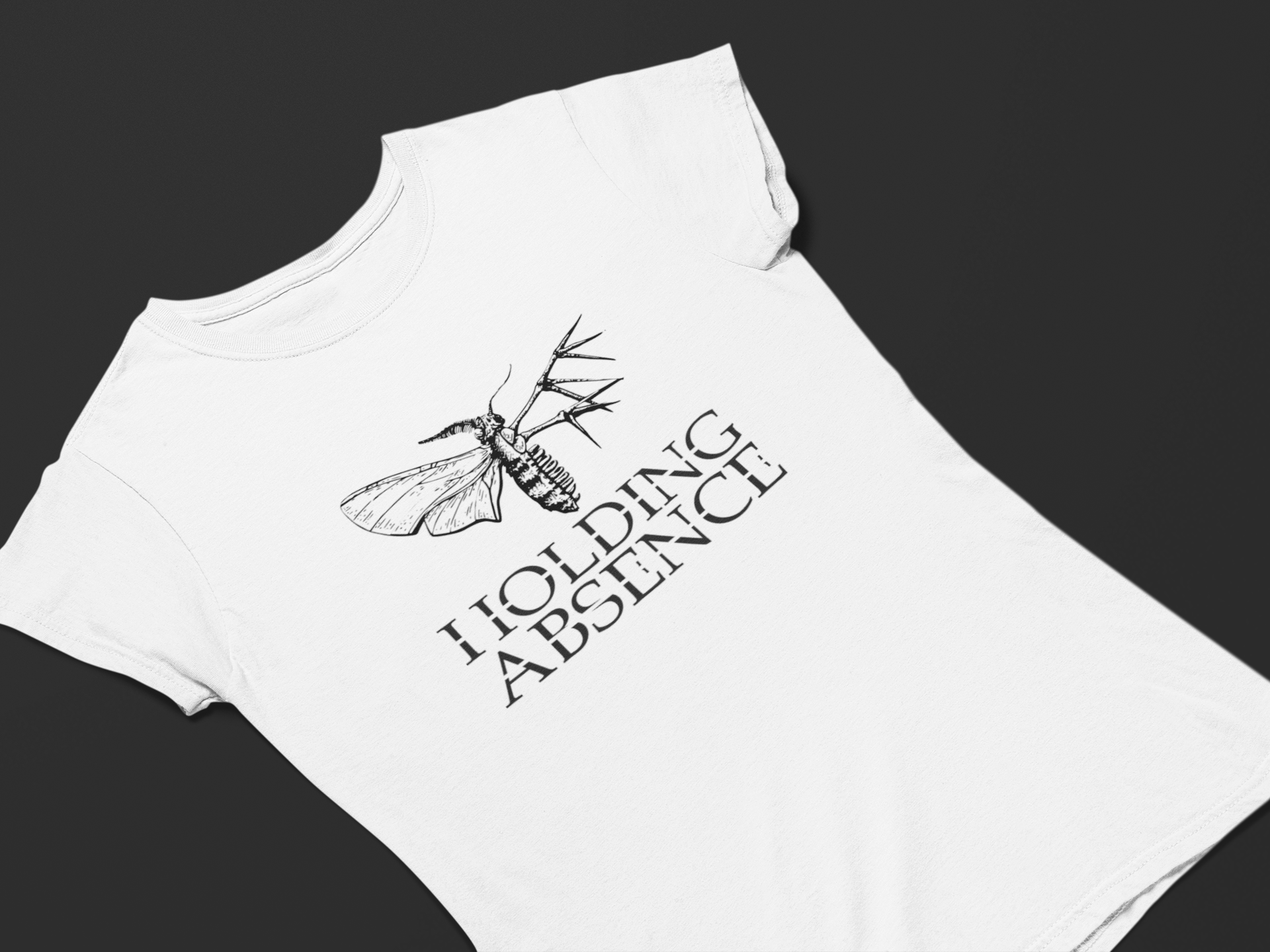 Nome do produto: Camiseta Dizbocado Corte BabyLook - Holding Absence