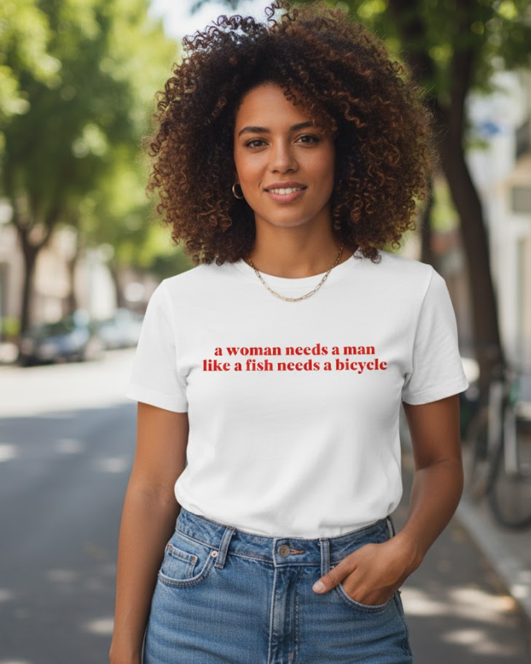 Nome do produto: a woman needs a man like a fish needs a bicycle (camiseta)
