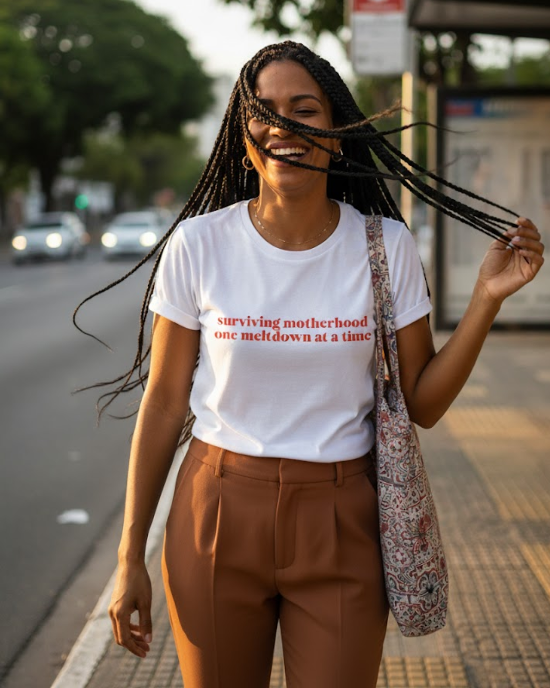 Nome do produto: surviving motherhood one meltdown at a time (camiseta)